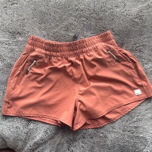 Vuori Dash Shorts color Coral